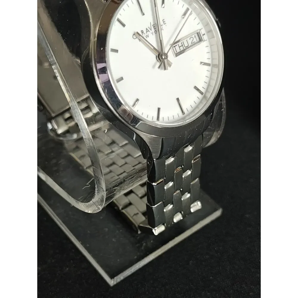 Caravelle by BULOVA 30mm Woman's Corporate Day / Date White Dial Watch NWB